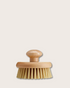 Brosse exfoliante en bois ronde avec poignée et fibres naturelles